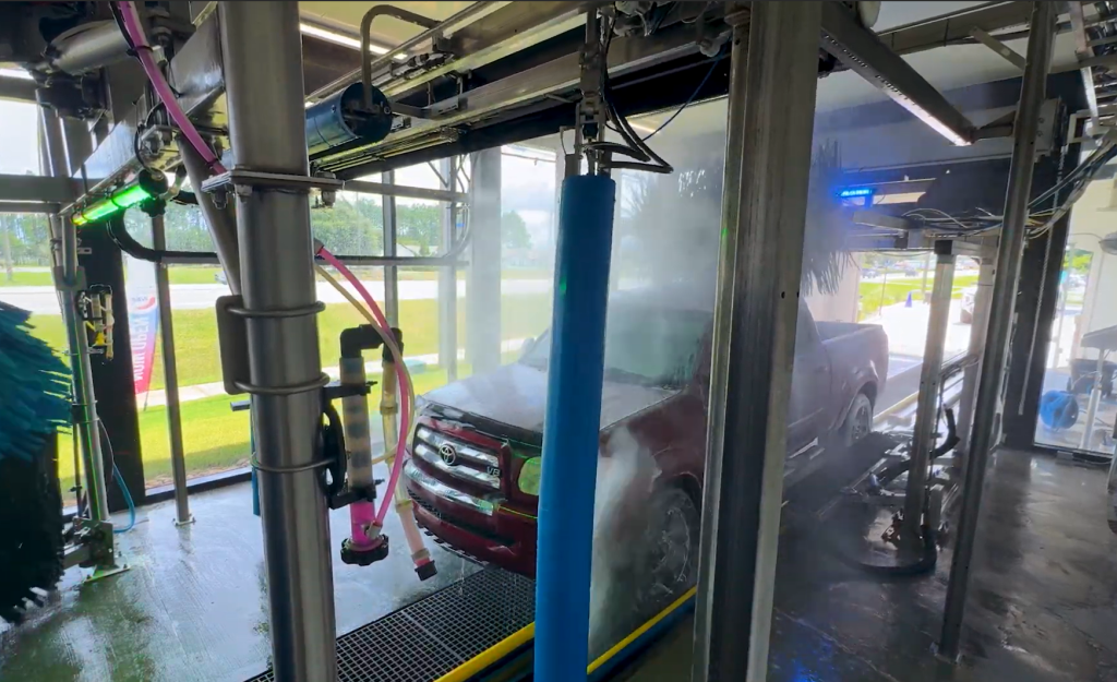 Truck in car wash with new technology
